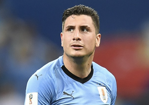 José María Giménez défenseur avec l’Uruguay pendant un match de football