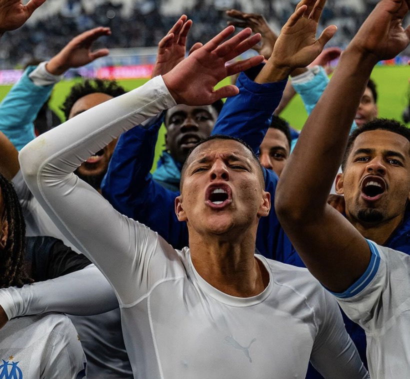 Les joueurs de l’OM qui célèbrent la victoire en Ligue Europa face au Benfica Lisbonne